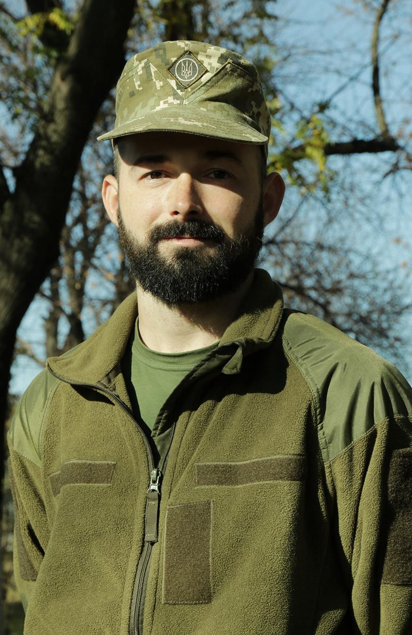 Image may contain: 1 person, beard and outdoor