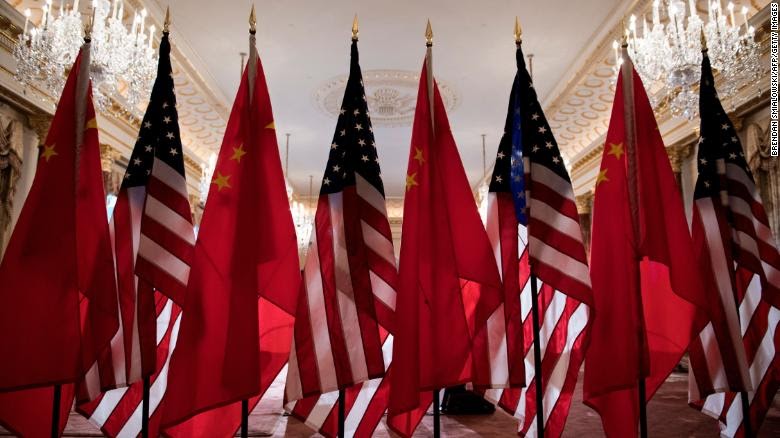 US and Chinese flags are seen as Secretary of State Mike Pompeo and China&#39;s Foreign Minister Wang Yi meet at the US Department of State May 23, 2018 in Washington, DC. (Photo by Brendan Smialowski / AFP) (Photo credit should read BRENDAN SMIALOWSKI/AFP/Getty Images)